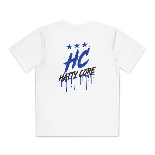 A white youth athletic tee features a bold blue HC emblem with three stars above it, and the words HATTY CORE in a playful, streetwise font. The design includes dripping paint effects, adding a dynamic touch to the shirt.